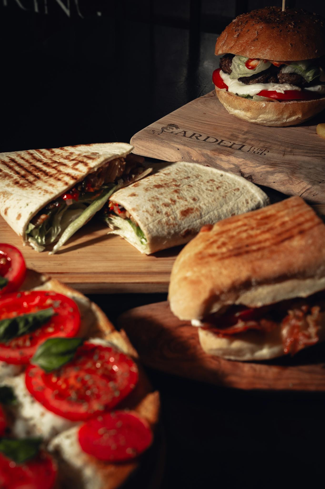 A tempting assortment of gourmet sandwiches with fresh ingredients, perfect for a casual meal.