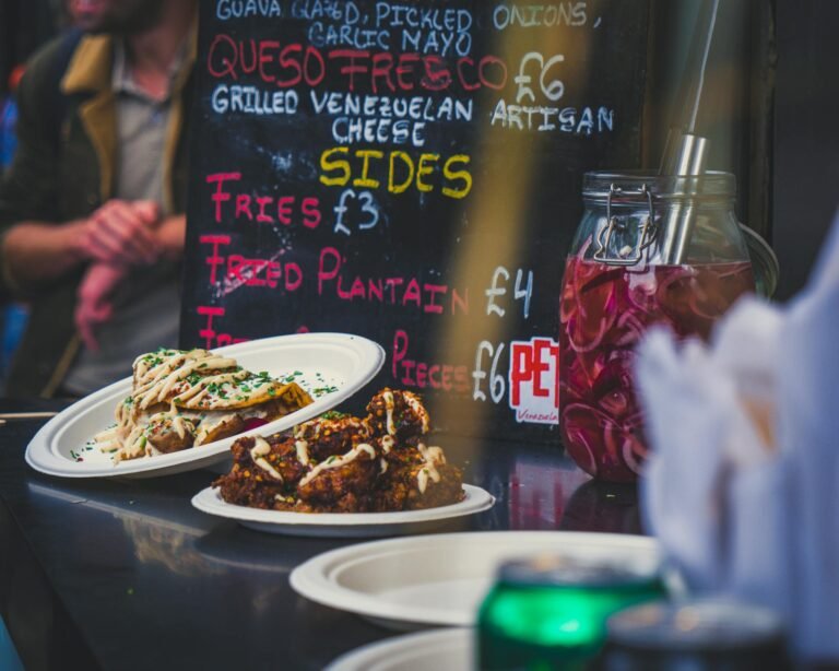 Delicious Venezuelan street food at a vibrant market stall in England.