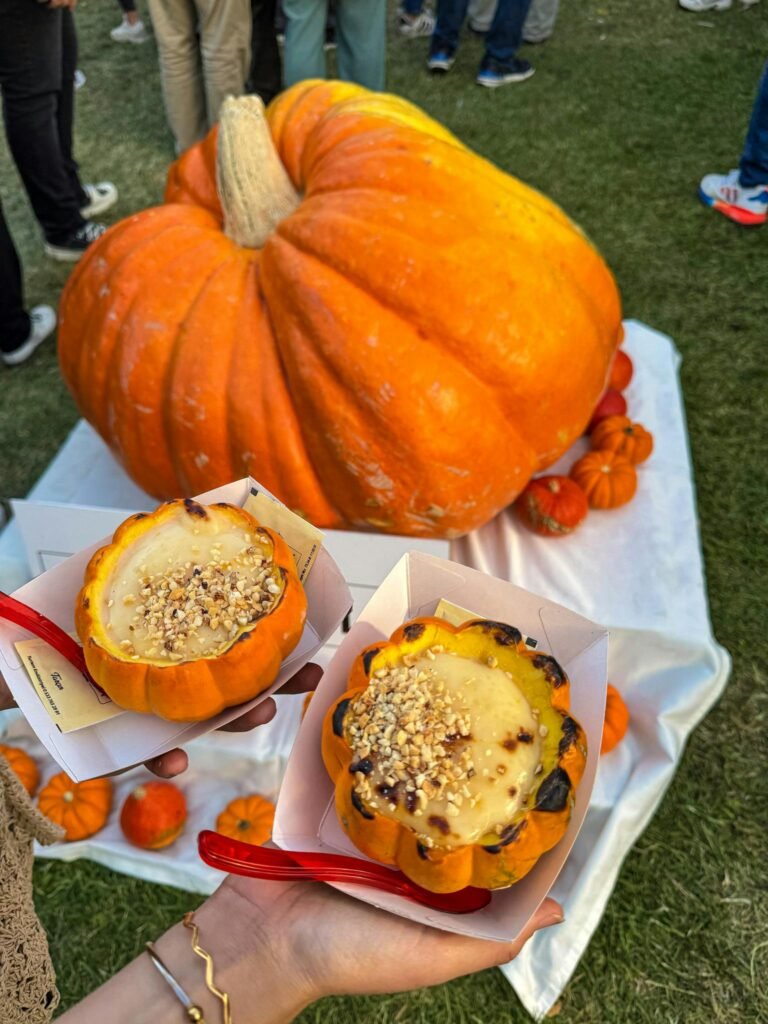 Giant pumpkin at Bursa festival with pumpkin-themed desserts, perfect for autumn vibes.